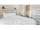 Primary suite featuring a king-sized bed and ensuite bathroom with glass enclosed shower at 200 Primrose Path # 11, Breckenridge, CO 80424