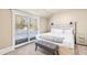 Bright bedroom featuring sliding glass doors and a neutral color palette at 200 Primrose Path # 11, Breckenridge, CO 80424