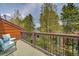 Scenic view from the patio surrounded by lush greenery and mature trees at 200 Primrose Path # 11, Breckenridge, CO 80424