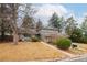 Two-story house with gray siding, landscaping, and a walkway at 4740 W 101St Pl, Westminster, CO 80031