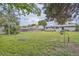 Spacious backyard features a well-maintained lawn and a secure wooden fence for privacy at 5925 W 86Th Ave, Arvada, CO 80003