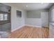 Open dining area with hardwood floors and neutral paint, offering versatile space at 5925 W 86Th Ave, Arvada, CO 80003