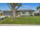 Cozy one story home featuring a well maintained lawn, inviting curb appeal, and mature shade tree at 5925 W 86Th Ave, Arvada, CO 80003