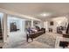 Open concept living room with plush carpeting, recessed lighting and stylish decor at 5925 W 86Th Ave, Arvada, CO 80003