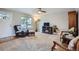 Bright living room features neutral walls, carpeting, and comfortable seating at 5925 W 86Th Ave, Arvada, CO 80003