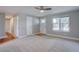 Spacious living room features new neutral carpet, lots of light, and a traditional front door at 5925 W 86Th Ave, Arvada, CO 80003