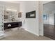 Bright bathroom with glass block divider, tile floors, dual sinks at 5980 Dunraven Ct, Golden, CO 80403