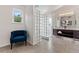 Bright bathroom with glass block divider, tile floors, dual sinks at 5980 Dunraven Ct, Golden, CO 80403