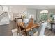 View from dining room into living room and kitchen at 5980 Dunraven Ct, Golden, CO 80403