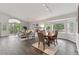 The dining room and living room are connected in an open-concept design at 5980 Dunraven Ct, Golden, CO 80403