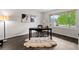 Bright office space with large window, hardwood floors and stylish decor at 5980 Dunraven Ct, Golden, CO 80403