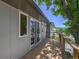 Exterior porch with wooden deck and a view of green tree leaves at 1073 Xenon St, Golden, CO 80401