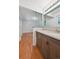 Bathroom view of the vanity with mirror and bedroom view at 1073 Xenon St, Golden, CO 80401