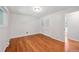 Bright bedroom featuring hardwood floors and ample natural light at 1073 Xenon St, Golden, CO 80401