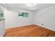 Bright room featuring gleaming hardwood floors and a sunlit window at 1073 Xenon St, Golden, CO 80401
