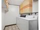 Functional laundry room with a modern washer and dryer set at 1073 Xenon St, Golden, CO 80401