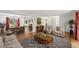 Spacious open-concept living room featuring wood floors, dining area and access to other living spaces at 1073 Xenon St, Golden, CO 80401