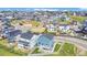 Aerial view of a new community featuring modern homes, landscaped yards, and neighborhood streets at 900 Eldorado Ln, Louisville, CO 80027