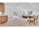 Finished basement with a wet bar, ample seating, and walkout access to the yard at 900 Eldorado Ln, Louisville, CO 80027