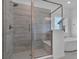 Modern bathroom with a glass-enclosed tiled shower, and a separate soaking tub at 900 Eldorado Ln, Louisville, CO 80027