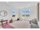 Bright bedroom with ample natural light, perfect for a playroom or room at 900 Eldorado Ln, Louisville, CO 80027