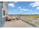Spacious deck featuring outdoor seating, ideal for entertaining or enjoying the scenic views at 900 Eldorado Ln, Louisville, CO 80027