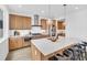 Spacious kitchen features stainless steel appliances, quartz countertops and ample cabinet space at 900 Eldorado Ln, Louisville, CO 80027