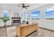 Cozy living room showcasing a stone fireplace, comfortable sofa, and an inviting atmosphere at 900 Eldorado Ln, Louisville, CO 80027
