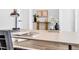 Close-up of a stylish desk setup with decor, books, and elegant desk accessories at 900 Eldorado Ln, Louisville, CO 80027