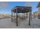 A stylish patio featuring a gazebo with outdoor seating and a grill, perfect for entertaining at 1392 S Duquesne Cir, Aurora, CO 80018