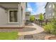 Backyard featuring stone pathway leading to a patio, creating a welcoming outdoor space at 23895 E Rocky Top Pl, Aurora, CO 80016