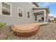 Backyard showcasing patio area that offers seamless indoor-outdoor living at 23895 E Rocky Top Pl, Aurora, CO 80016