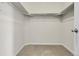Walk-in closet with ample hanging and storage space at 23895 E Rocky Top Pl, Aurora, CO 80016