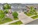 Beautiful two-story home boasts manicured lawn, mature trees, and a spacious three-car garage at 23895 E Rocky Top Pl, Aurora, CO 80016