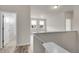 Second floor loft space with plenty of natural light at 23895 E Rocky Top Pl, Aurora, CO 80016