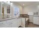 Elegant bathroom with granite countertop and soaking tub at 9877 Grove St # C, Westminster, CO 80031