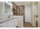 Modern bathroom featuring a walk-in shower and updated vanity at 9877 Grove St # C, Westminster, CO 80031