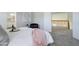 Comfortable bedroom with a loft view and ensuite bath at 9877 Grove St # C, Westminster, CO 80031