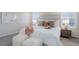 Bright bedroom featuring a king-size bed and stylish decor at 9877 Grove St # C, Westminster, CO 80031