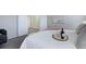 Relaxing bedroom with a king-size bed and adjacent bathroom at 9877 Grove St # C, Westminster, CO 80031