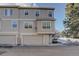 Exterior view of a townhome with attached garage at 9877 Grove St # C, Westminster, CO 80031