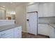 Kitchen with white cabinets, granite countertops, and stainless steel appliances at 9877 Grove St # C, Westminster, CO 80031