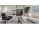 Cozy living room featuring a fireplace and comfortable seating at 9877 Grove St # C, Westminster, CO 80031