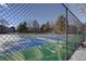 Outdoor tennis courts with chain link fence at 9877 Grove St # C, Westminster, CO 80031