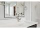 Modern bathroom showcasing a sleek vanity with a vessel sink, and tiled shower featuring refined fixtures at 23814 E 36Th Pl, Aurora, CO 80019
