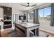 Bright kitchen with an eat-in dining space with table and large windows at 23814 E 36Th Pl, Aurora, CO 80019