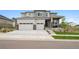 Charming two-story home with a three-car garage, well-maintained lawn, and inviting porch at 23814 E 36Th Pl, Aurora, CO 80019