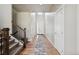 Bright entry foyer featuring hardwood floors, staircase and white front door at 23814 E 36Th Pl, Aurora, CO 80019