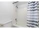 Bathroom featuring a shower and tub combination with white tile at 1020 15Th St # 15K, Denver, CO 80202