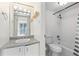 The bathroom offers a modern vanity and shower-tub combination at 1020 15Th St # 15K, Denver, CO 80202